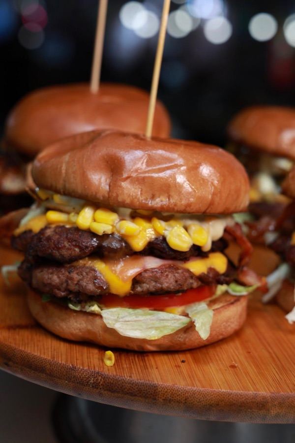 Double smash burger with American cheese and bacon
